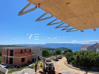 APPARTAMENTO SU DUE PIANI IN NUOVO EDIFICIO CON PISCINA E VISTA MARE