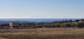 Terreno con vista mare e permesso di costruire per una villa