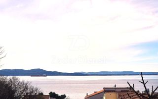 Terreno di 1602 m2 con vista mare a Kožino