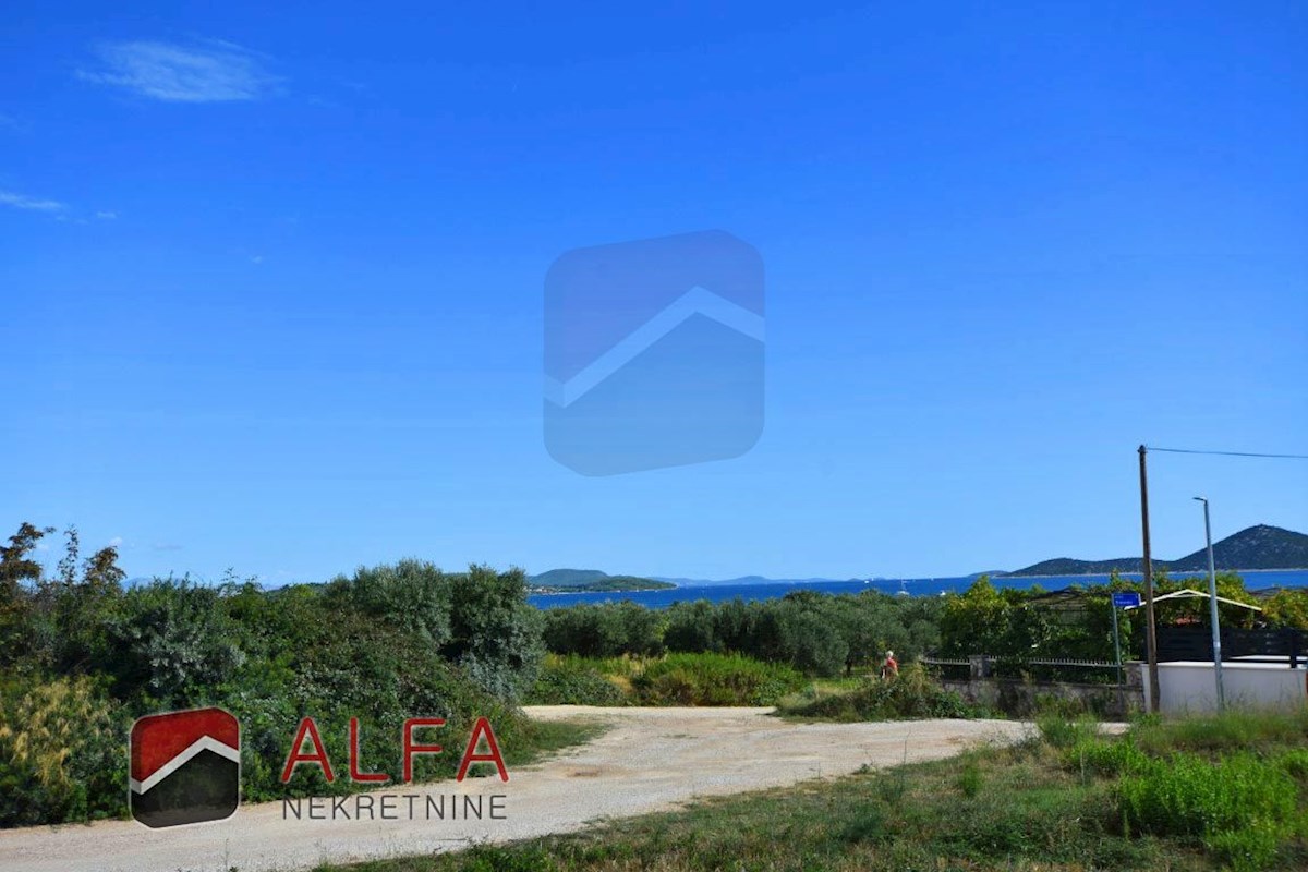 Croazia,Tribunj, in vendita attraente terreno edificabile con vista mare