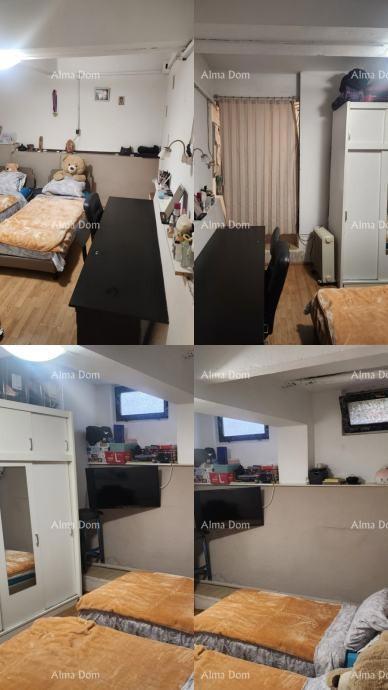 Vendita di due appartamenti al piano terra di una casa con giardino