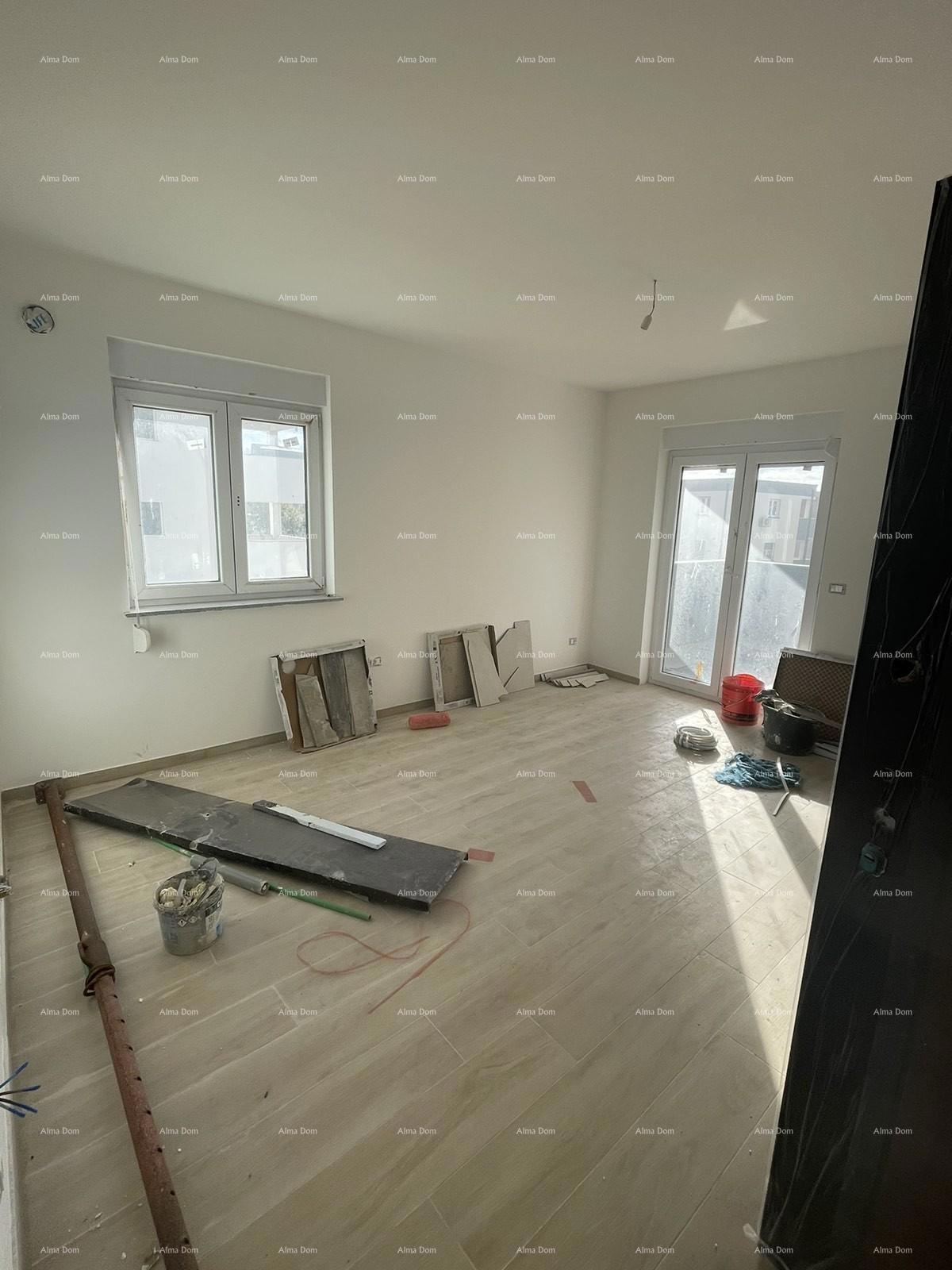 In vendita casa con tre appartamenti a Medolino