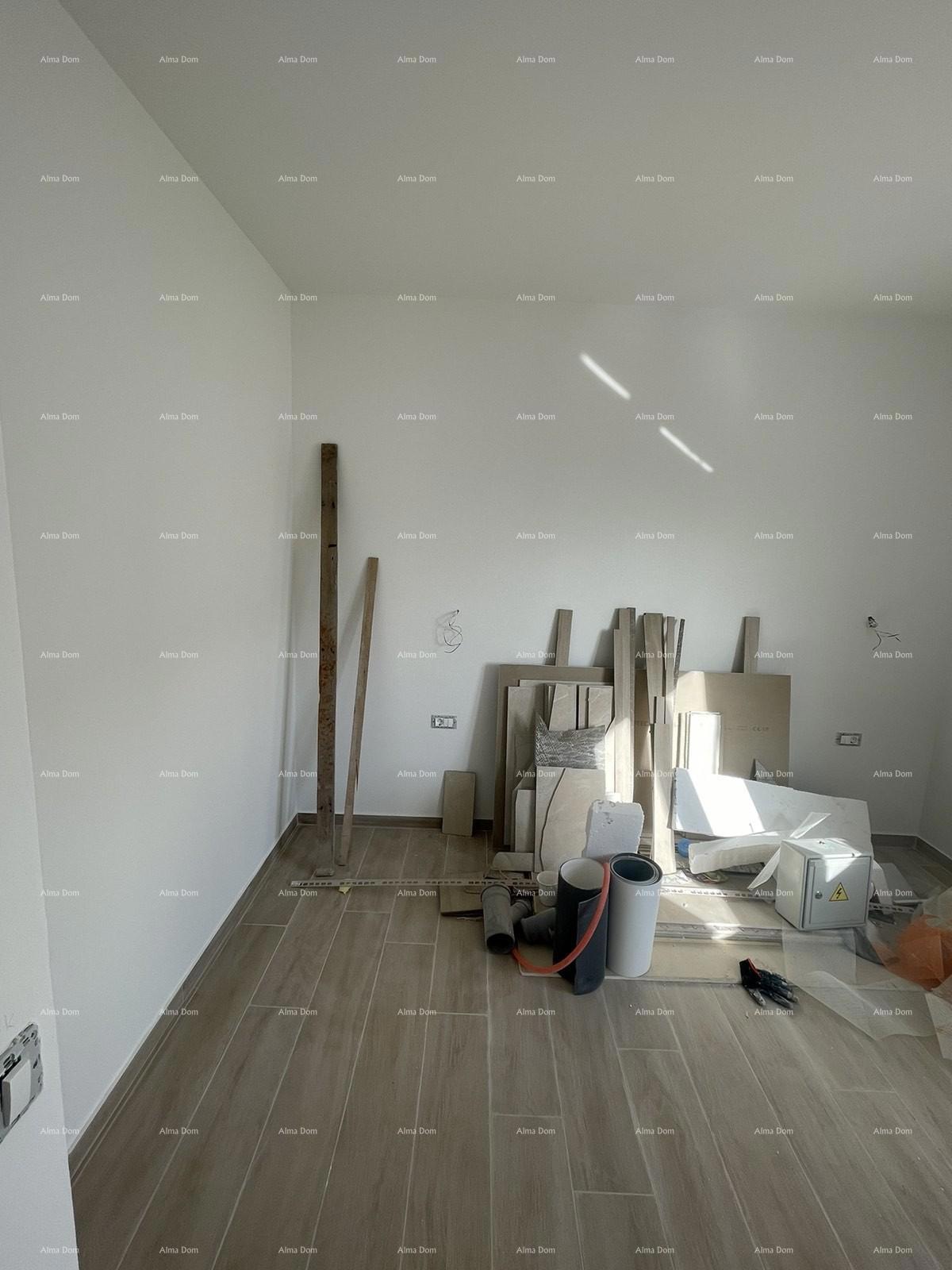 In vendita casa con tre appartamenti a Medolino