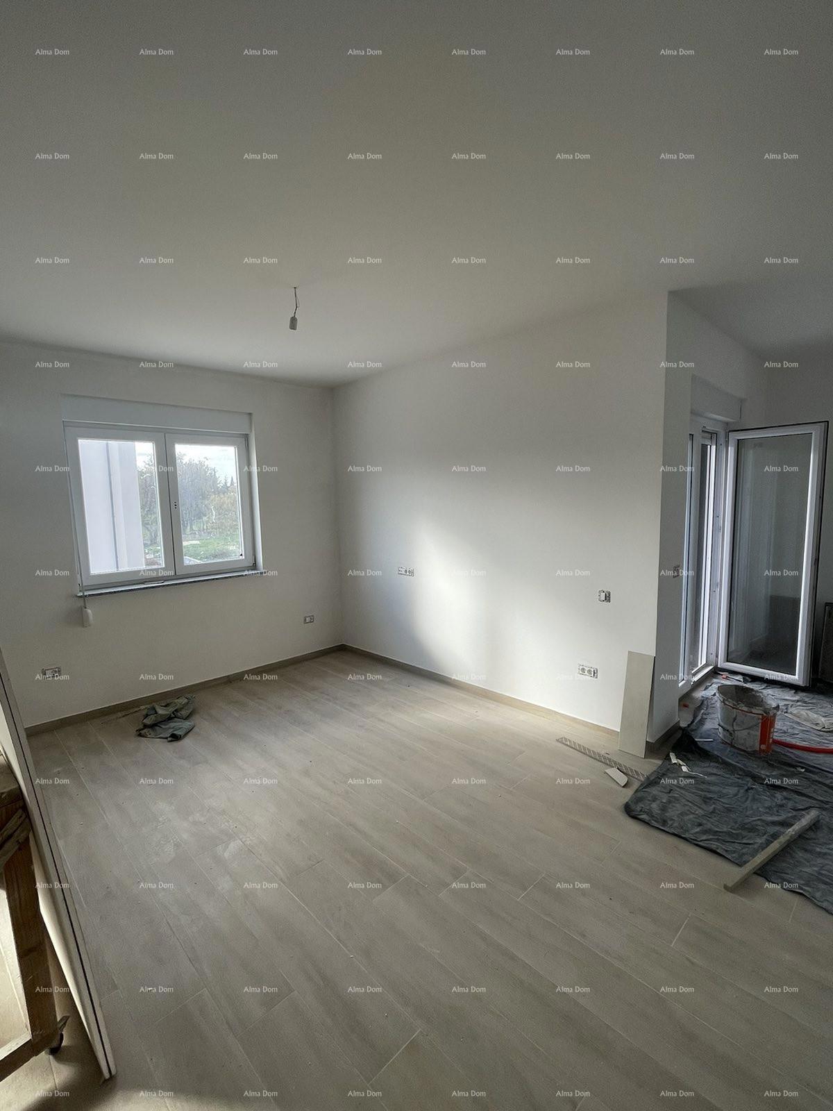 In vendita casa con tre appartamenti a Medolino