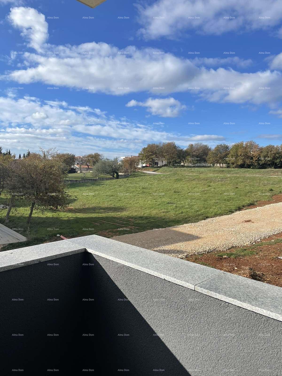 In vendita casa con tre appartamenti a Medolino