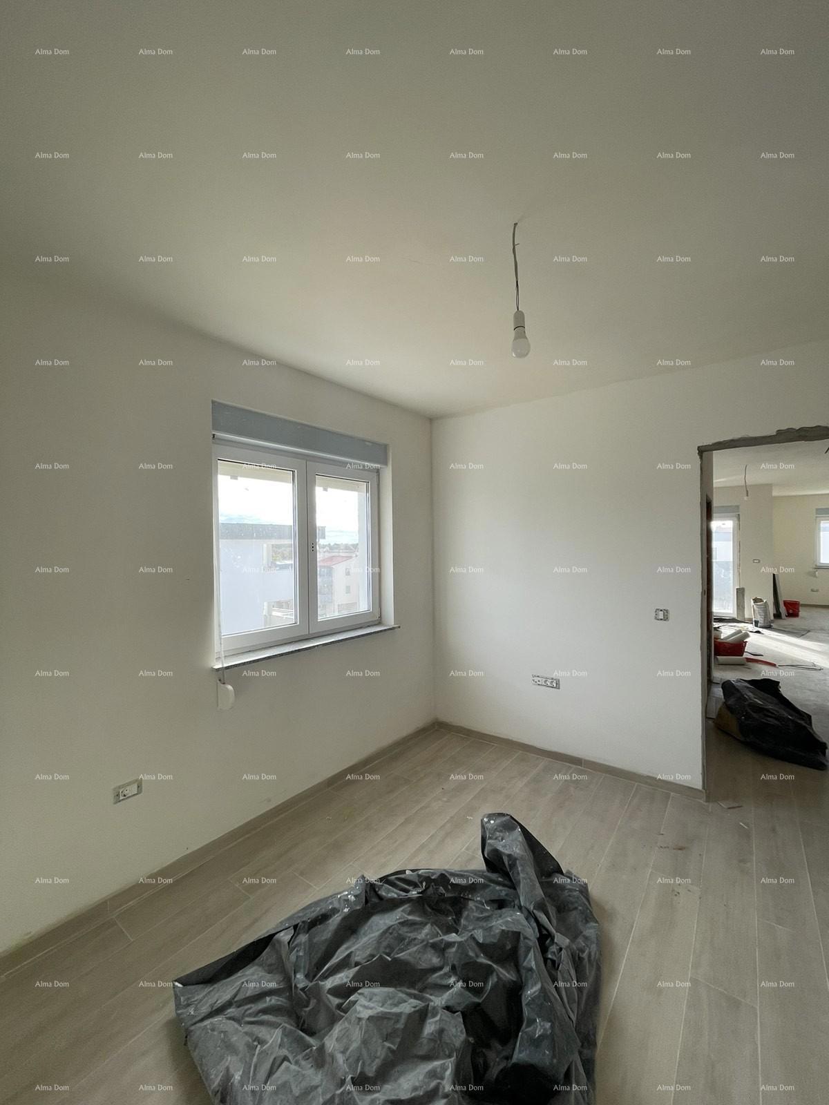 In vendita casa con tre appartamenti a Medolino