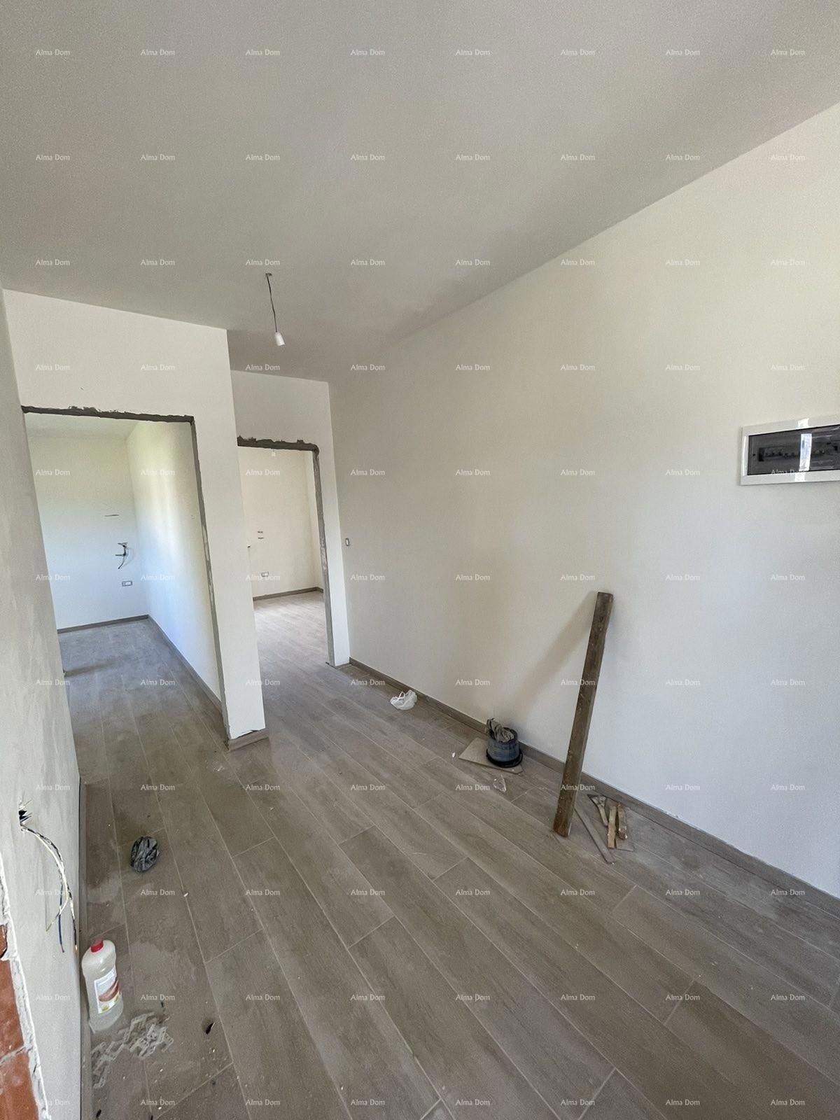 In vendita casa con tre appartamenti a Medolino