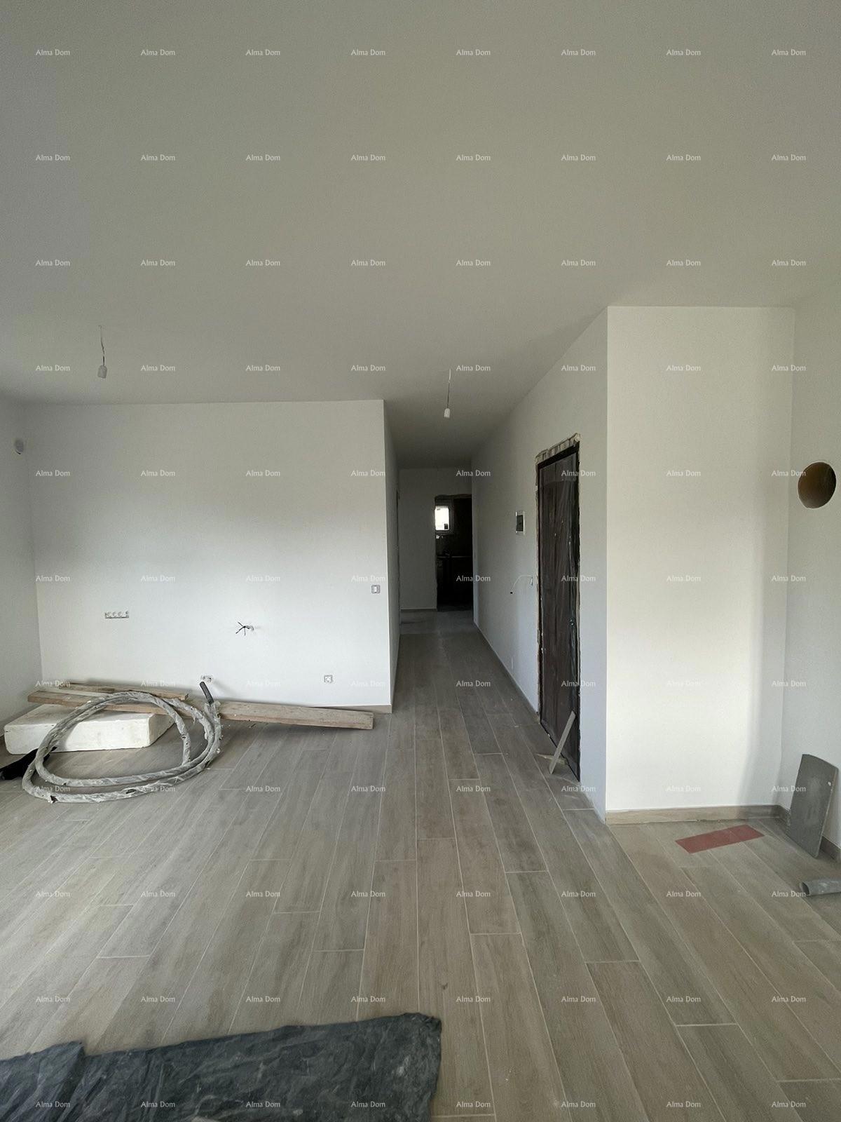 In vendita casa con tre appartamenti a Medolino