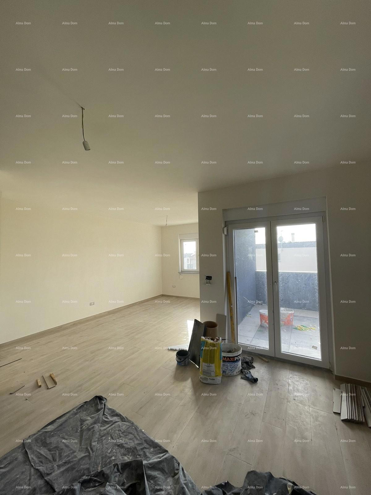 In vendita casa con tre appartamenti a Medolino