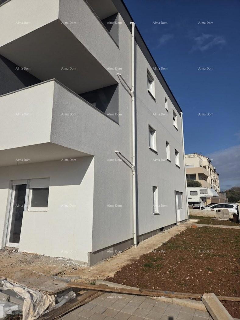 In vendita casa con tre appartamenti a Medolino