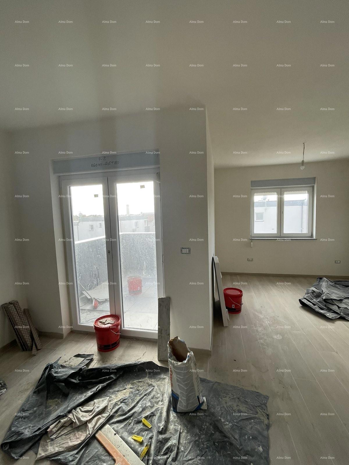 In vendita casa con tre appartamenti a Medolino