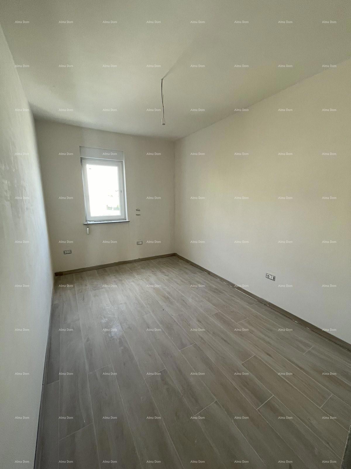 In vendita casa con tre appartamenti a Medolino