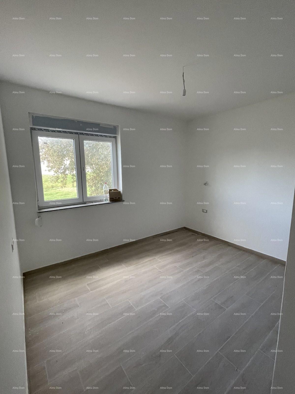 In vendita casa con tre appartamenti a Medolino