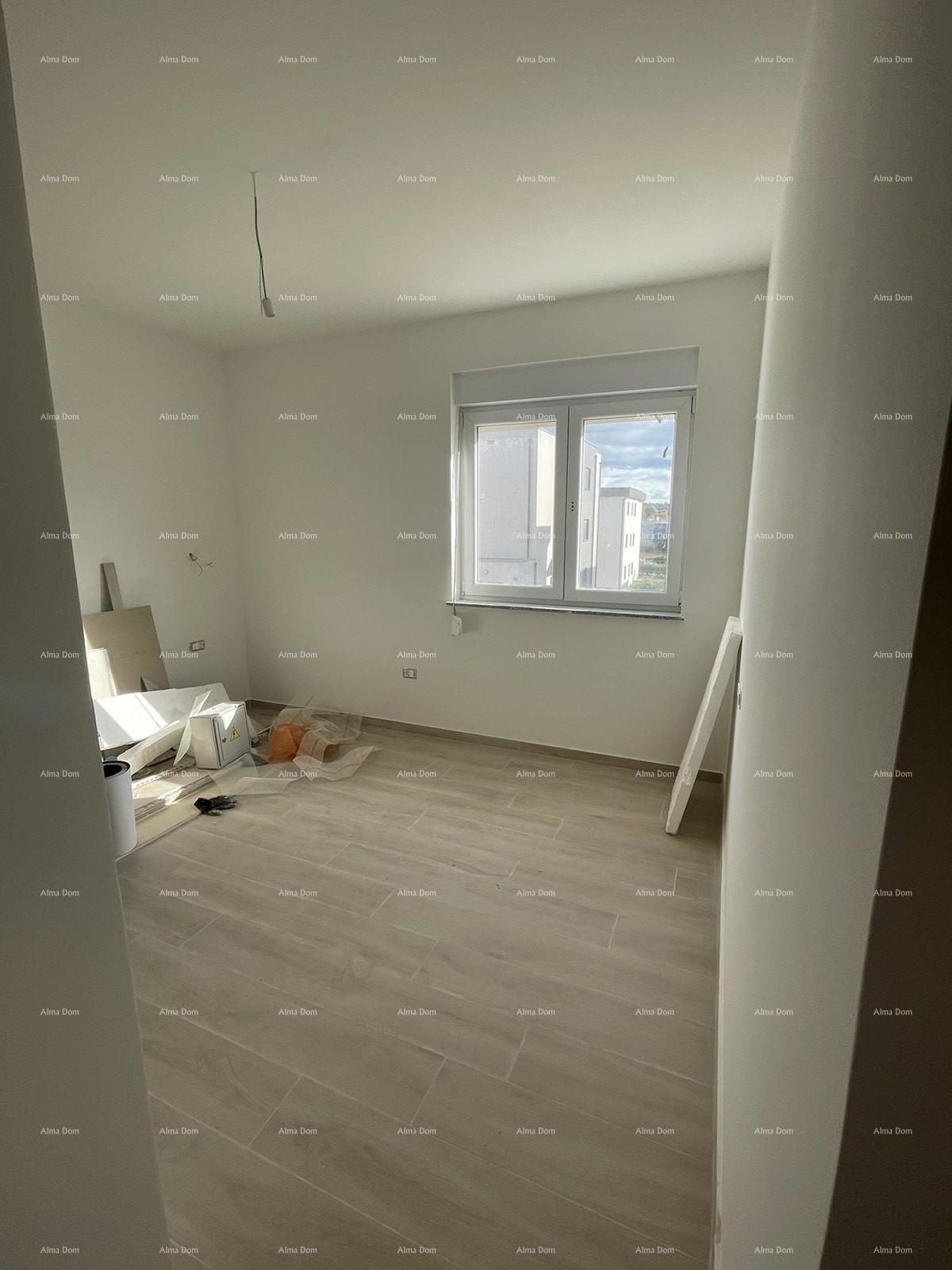 In vendita casa con tre appartamenti a Medolino