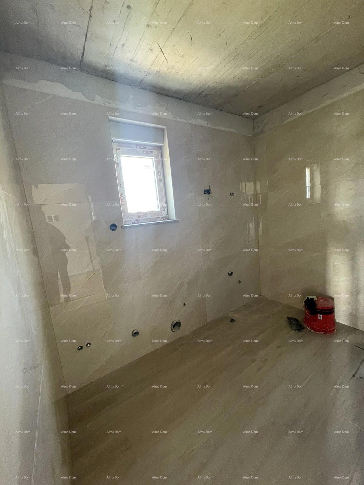 In vendita casa con tre appartamenti a Medolino