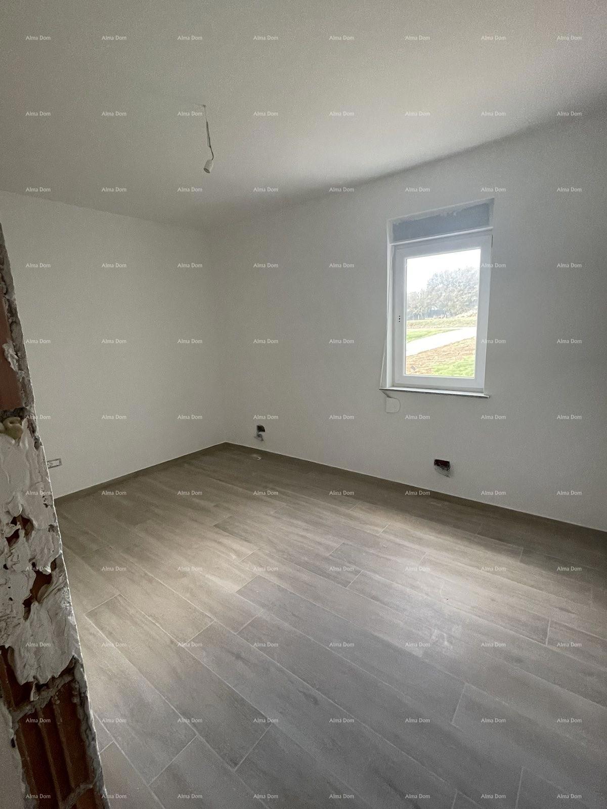 In vendita casa con tre appartamenti a Medolino