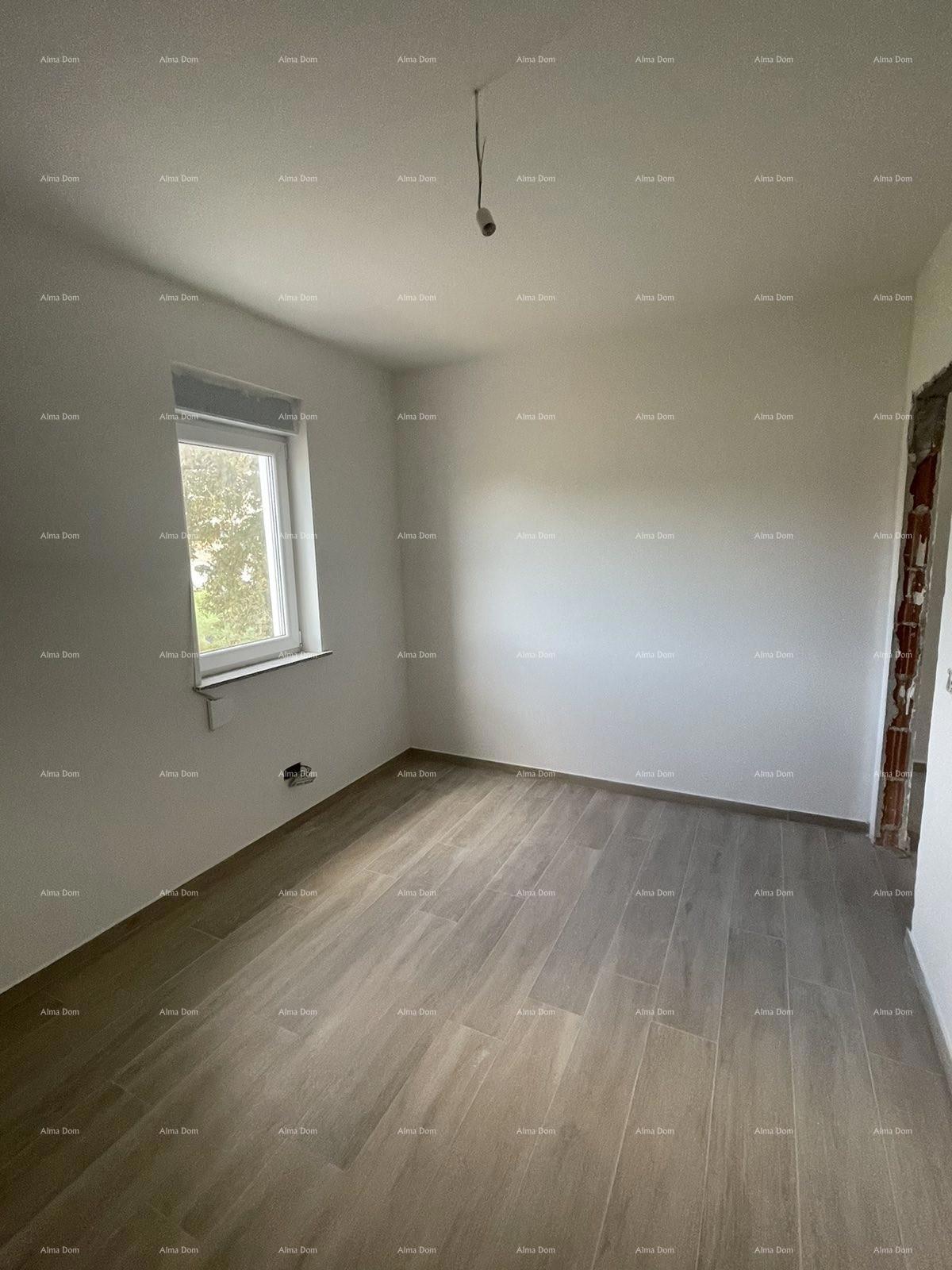 In vendita casa con tre appartamenti a Medolino