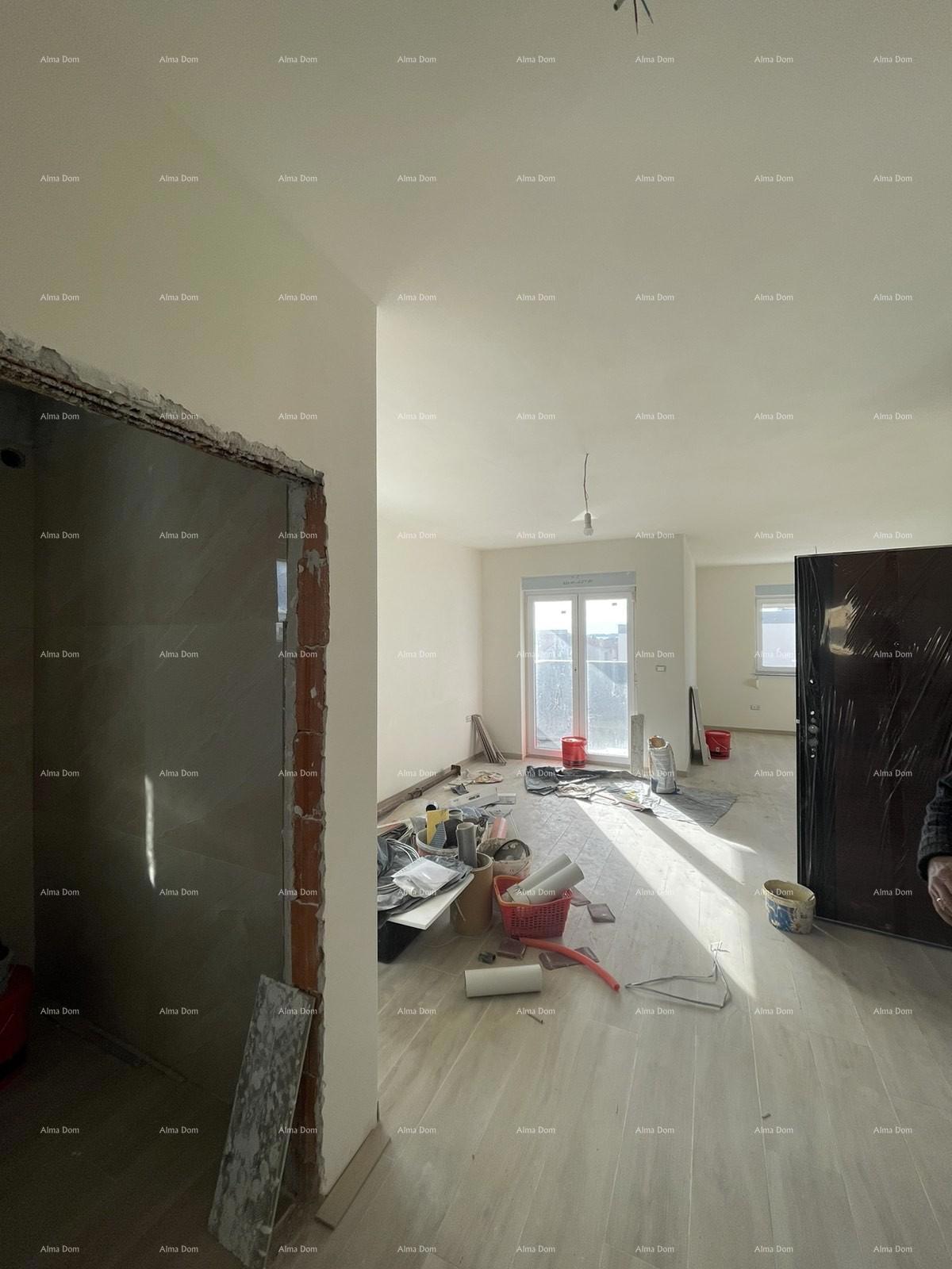 In vendita casa con tre appartamenti a Medolino