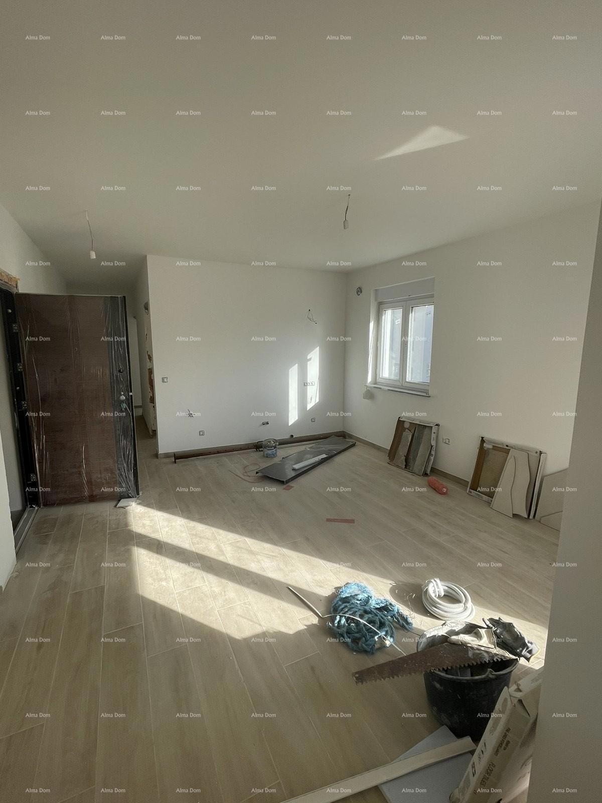 In vendita casa con tre appartamenti a Medolino