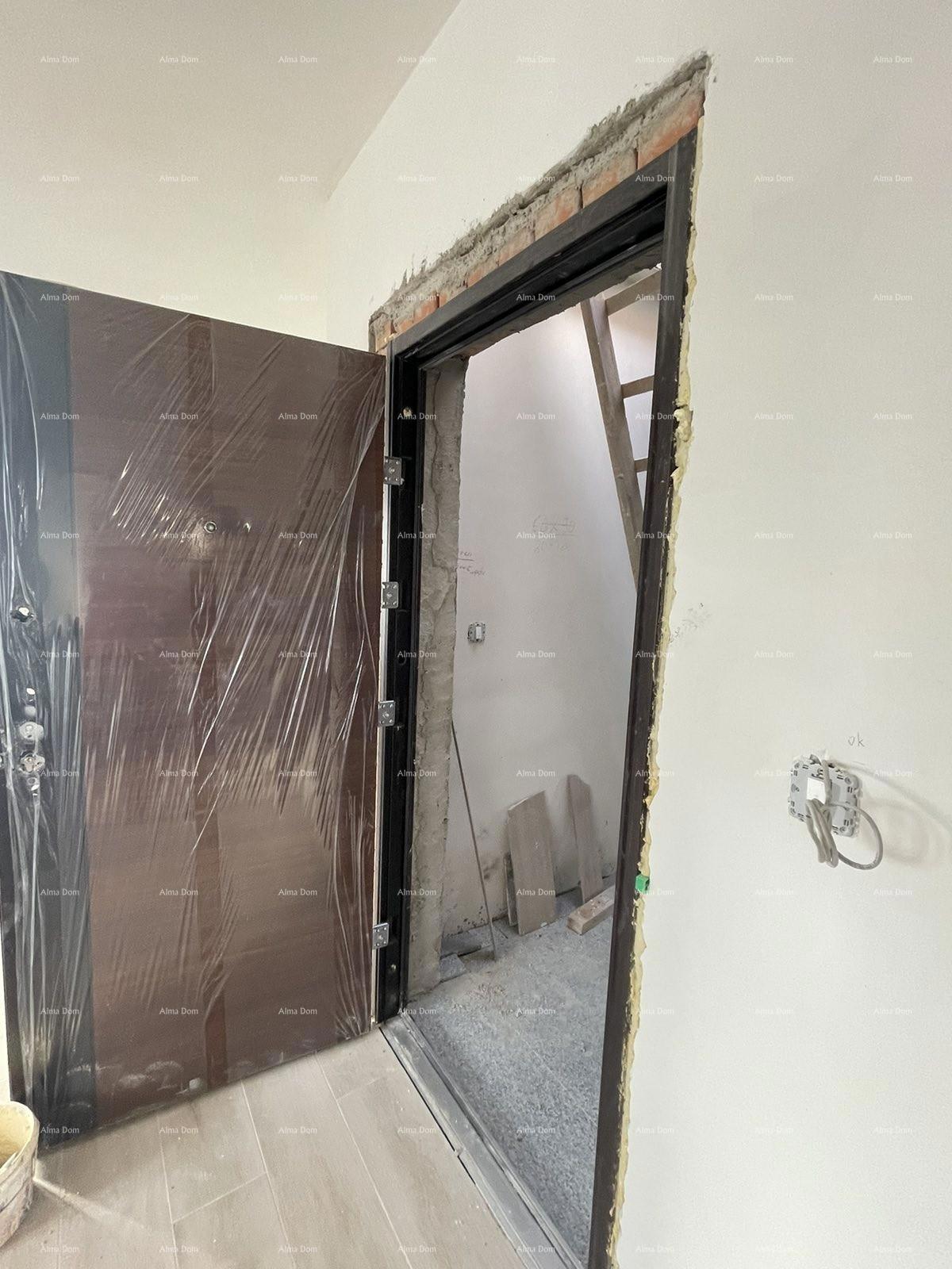 In vendita casa con tre appartamenti a Medolino