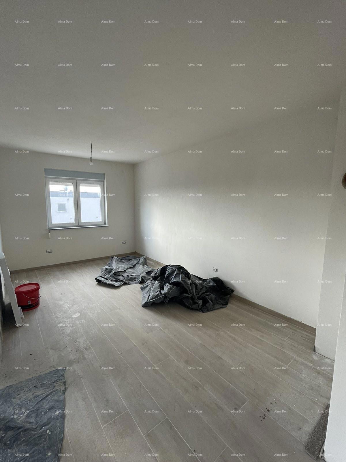 In vendita casa con tre appartamenti a Medolino