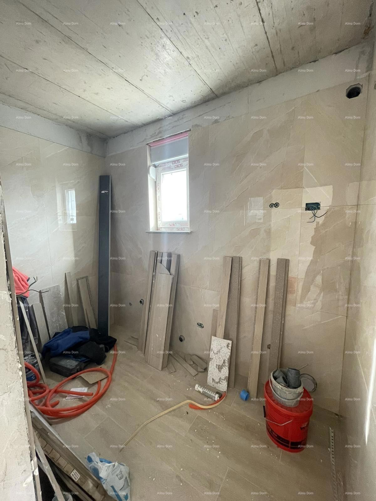 In vendita casa con tre appartamenti a Medolino