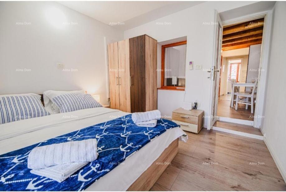 Vendita di un appartamento arredato e ristrutturato - prima fila sul mare! Umago