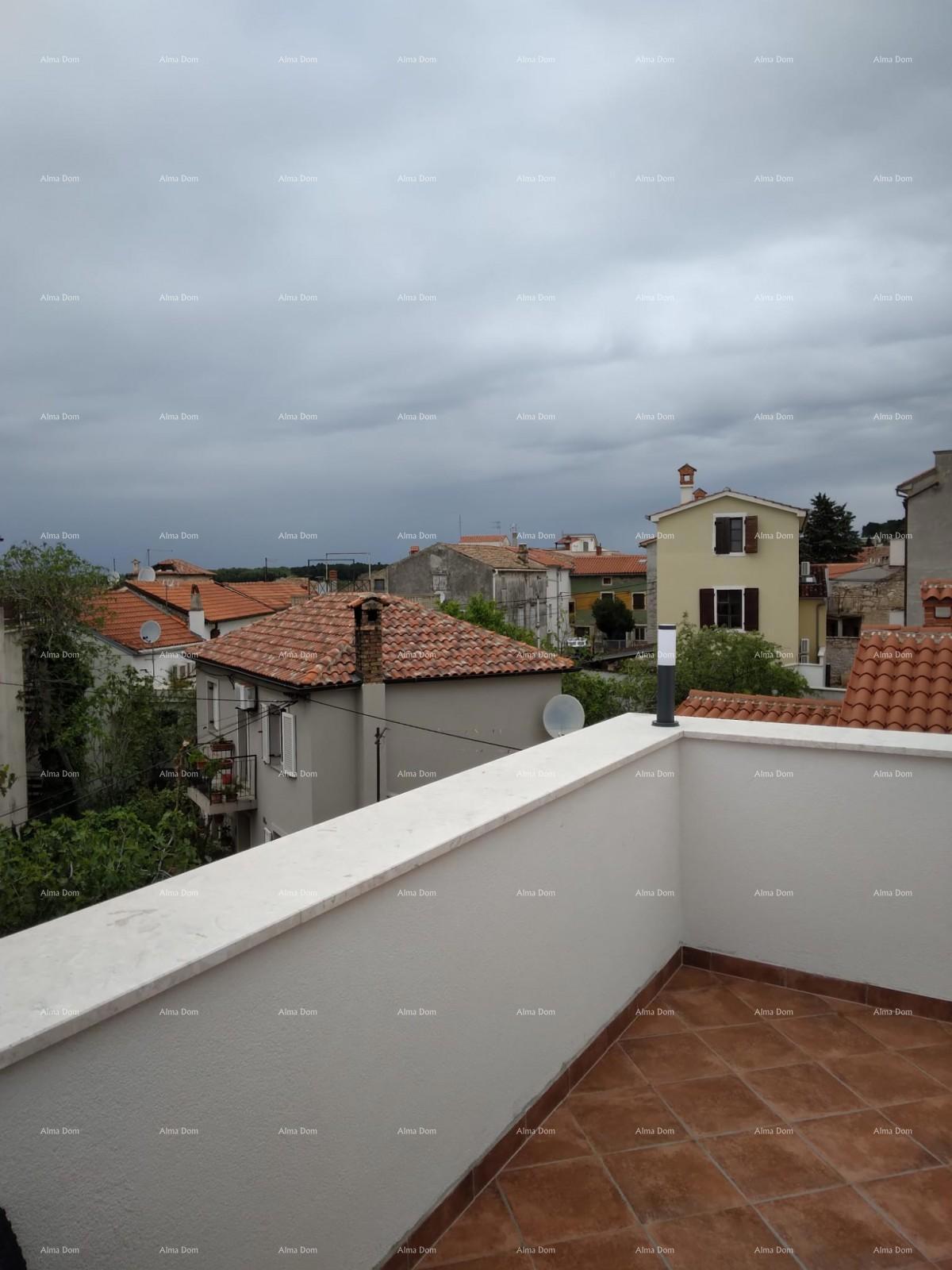 Casa con due appartamenti nel centro di Medulin