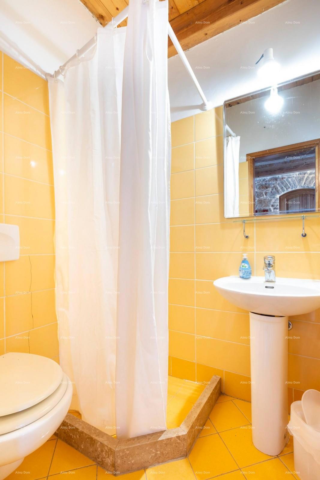 Marcana. Due case in pietra con piscina.