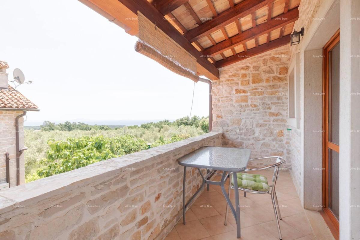 Marcana. Due case in pietra con piscina.