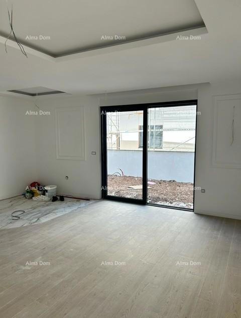 Vendiamo appartamento in nuova costruzione con giardino! ŠTINJAN.