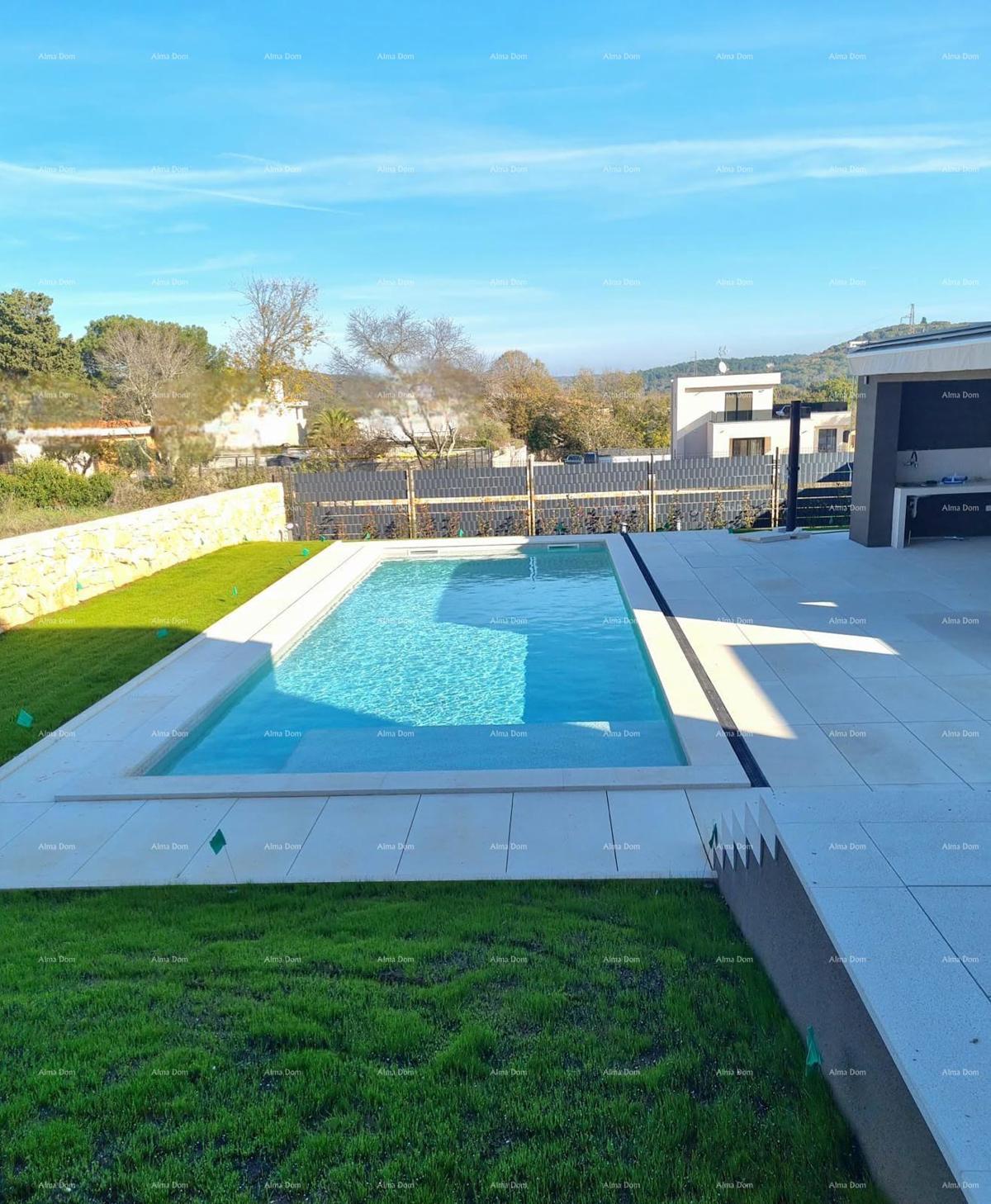 Vendesi una casa moderna con piscina situata in un idilliaco villaggio vicino a Rovigno.