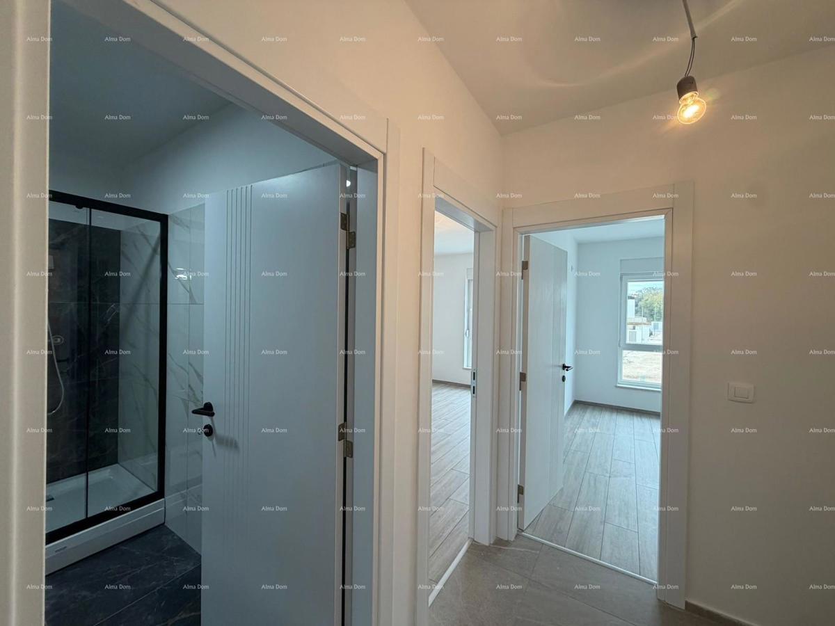 In vendita moderno appartamento con posto auto, a Medolino. Posizione eccezionale!