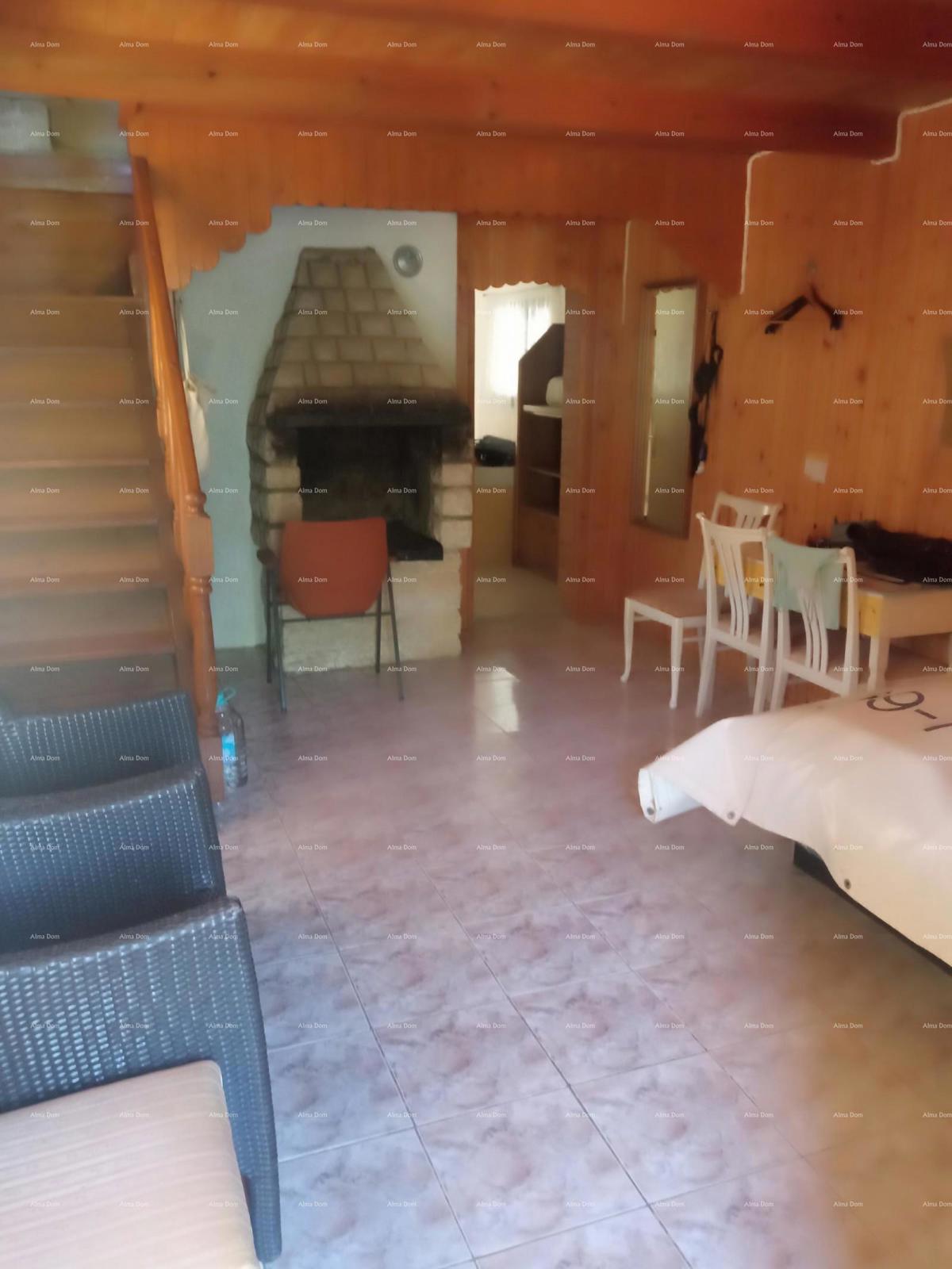 In vendita casa vacanze con giardino, Marčana