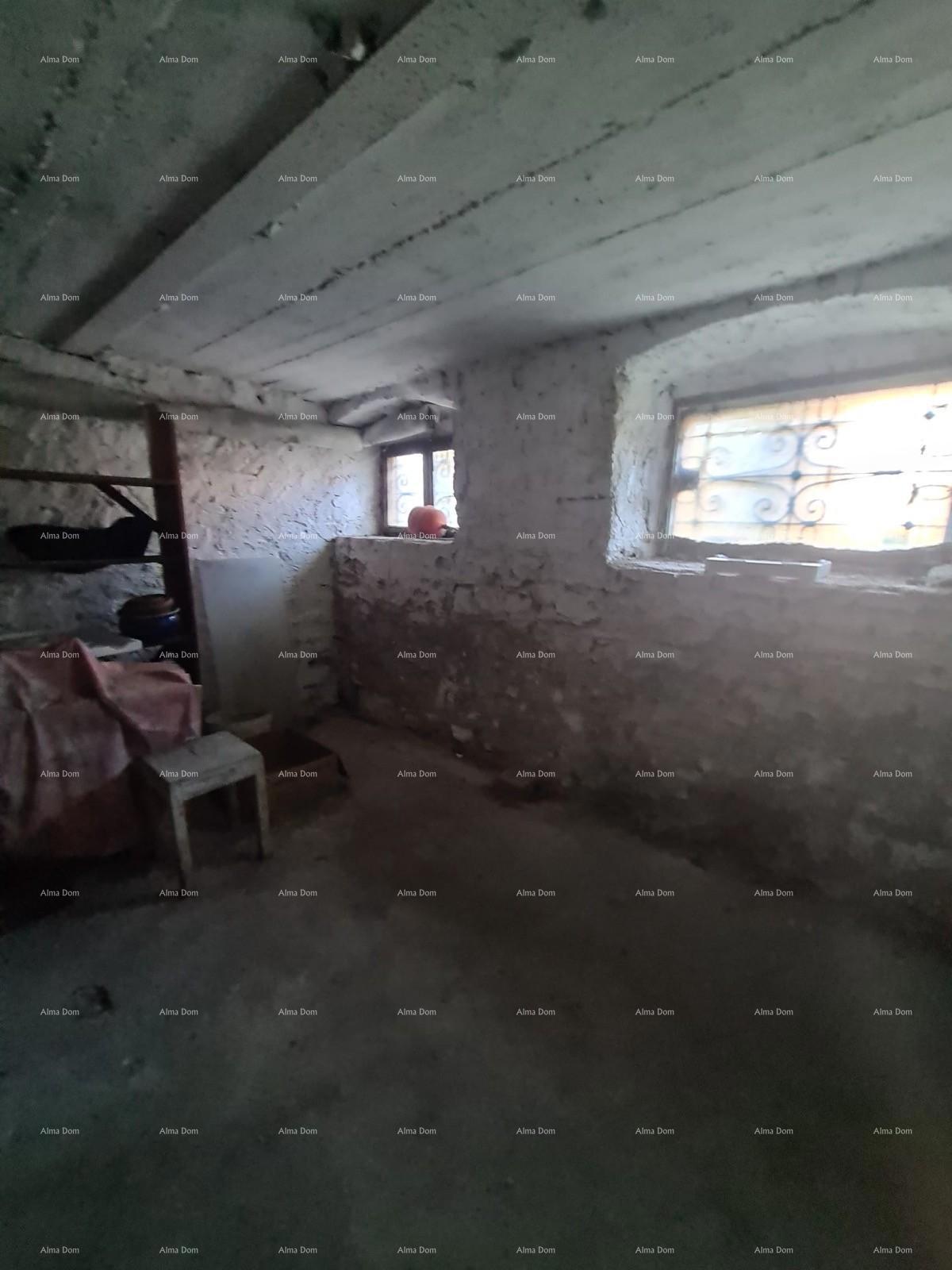 Stan al piano terra con giardino e garage – centro di Pola