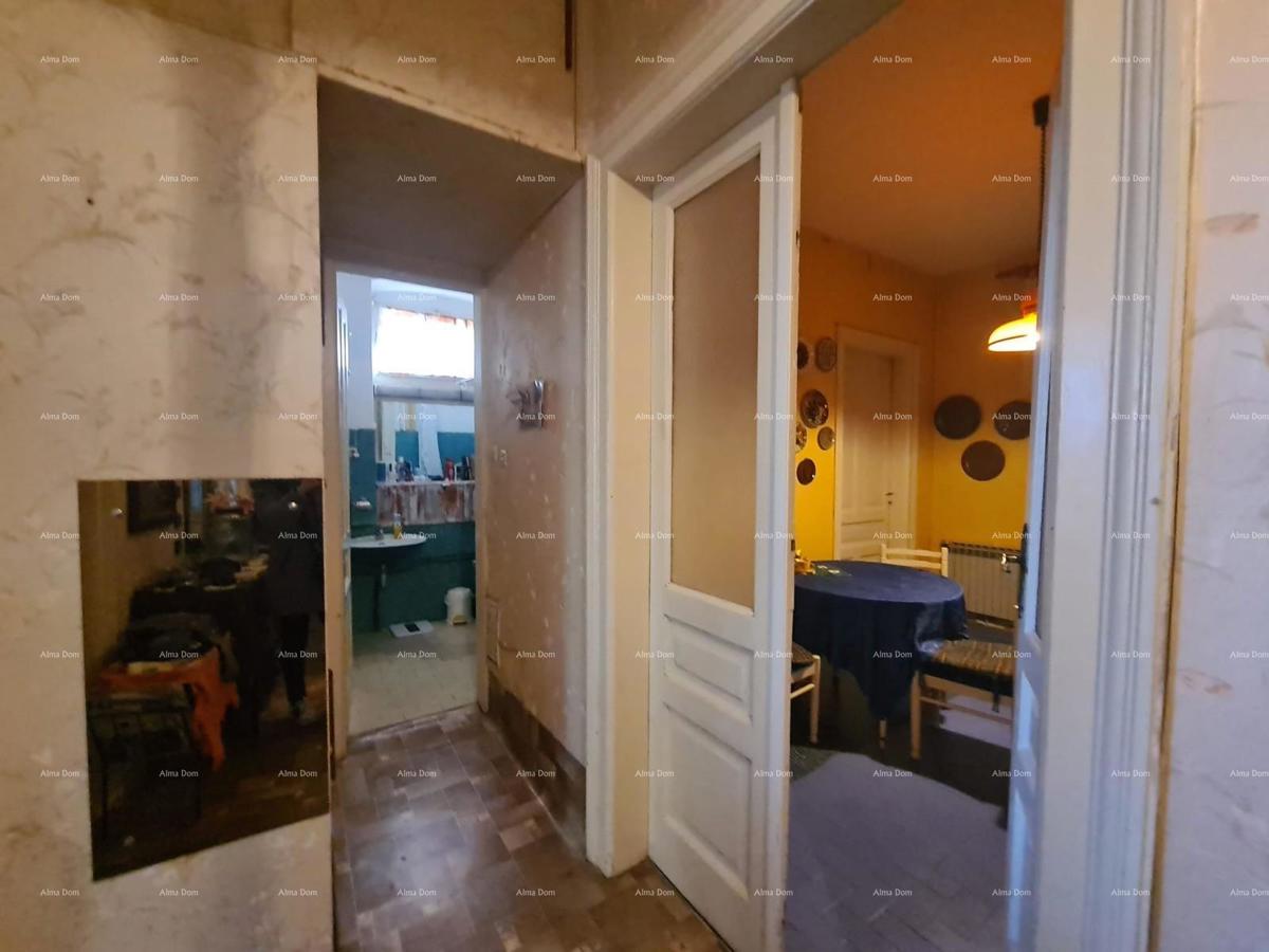 Stan al piano terra con giardino e garage – centro di Pola