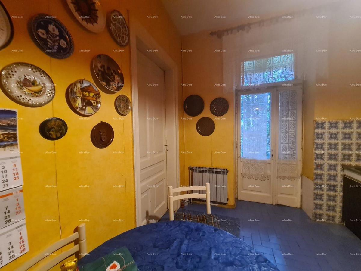 Stan al piano terra con giardino e garage – centro di Pola