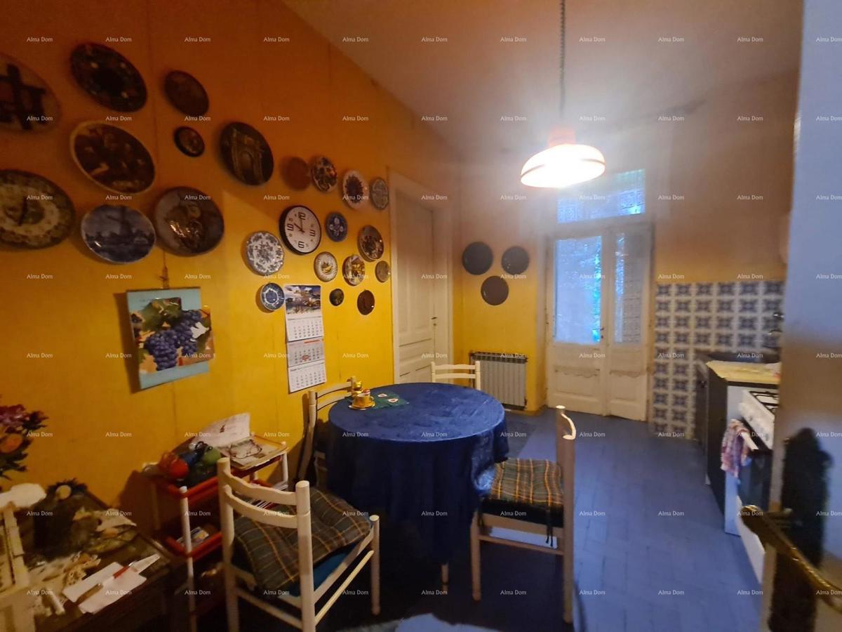 Stan al piano terra con giardino e garage – centro di Pola