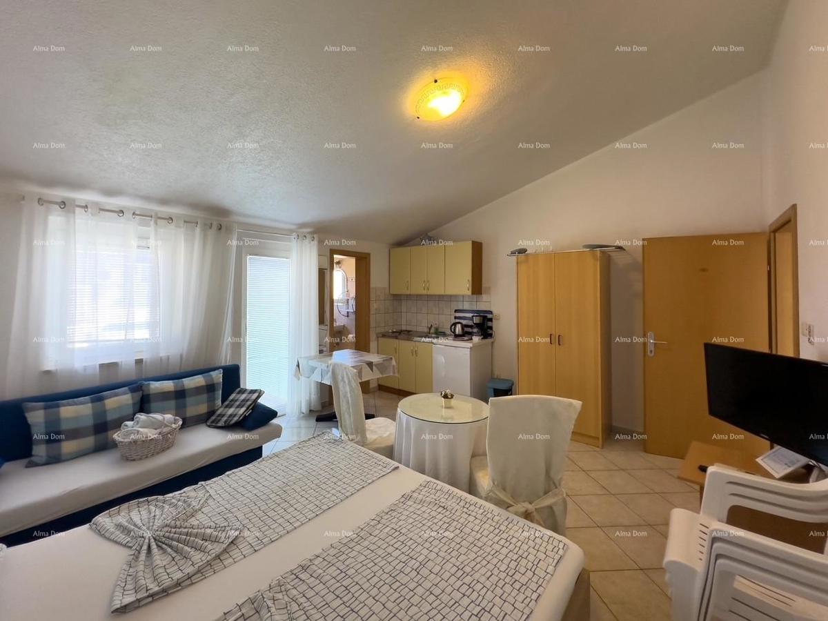 MEDULIN! Appartamento studio al secondo piano di un edificio in condominio.