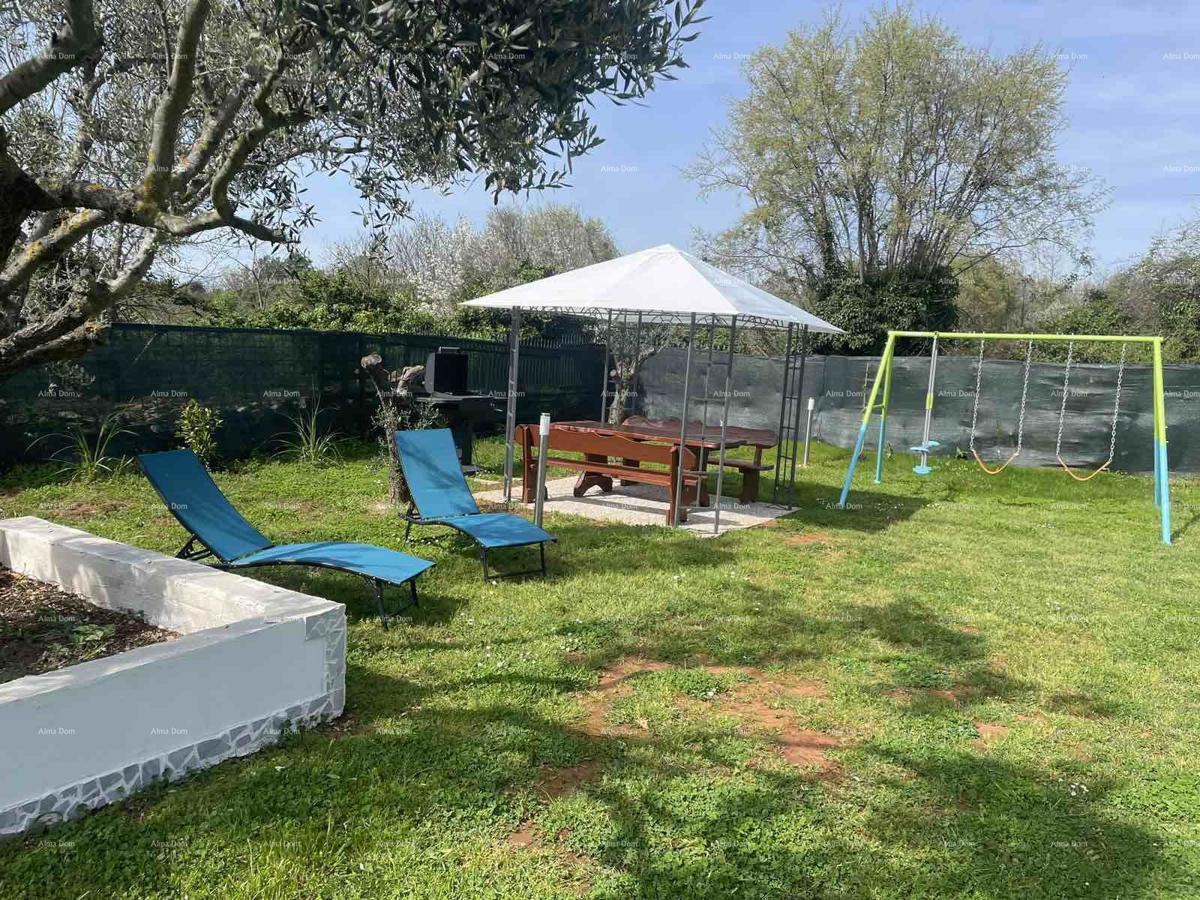 Casa su un piano con ampio giardino