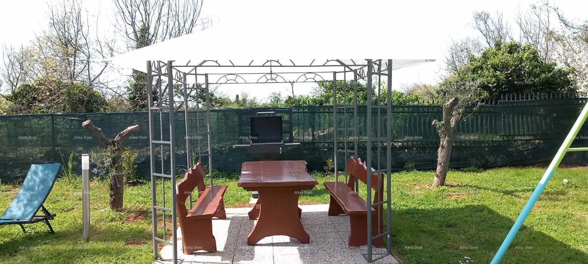 Casa su un piano con ampio giardino