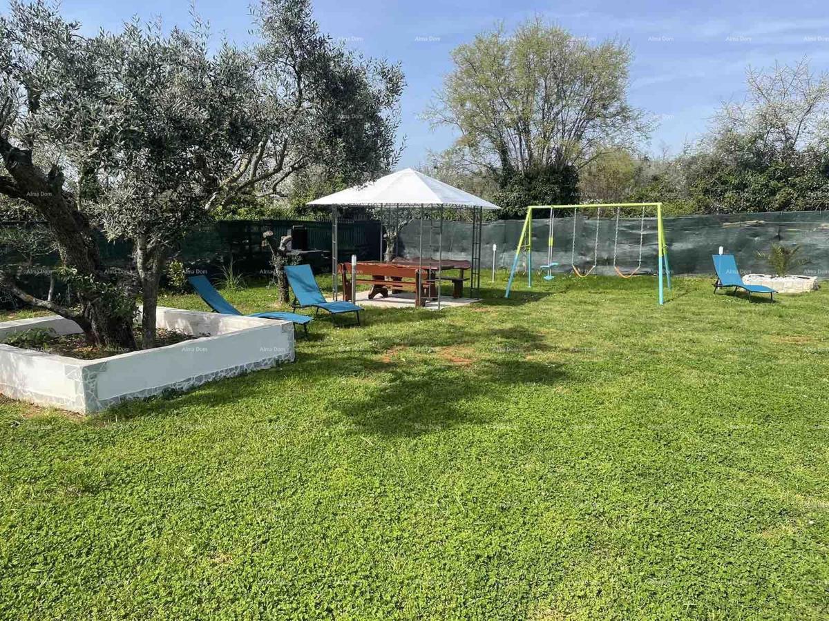 Casa su un piano con ampio giardino