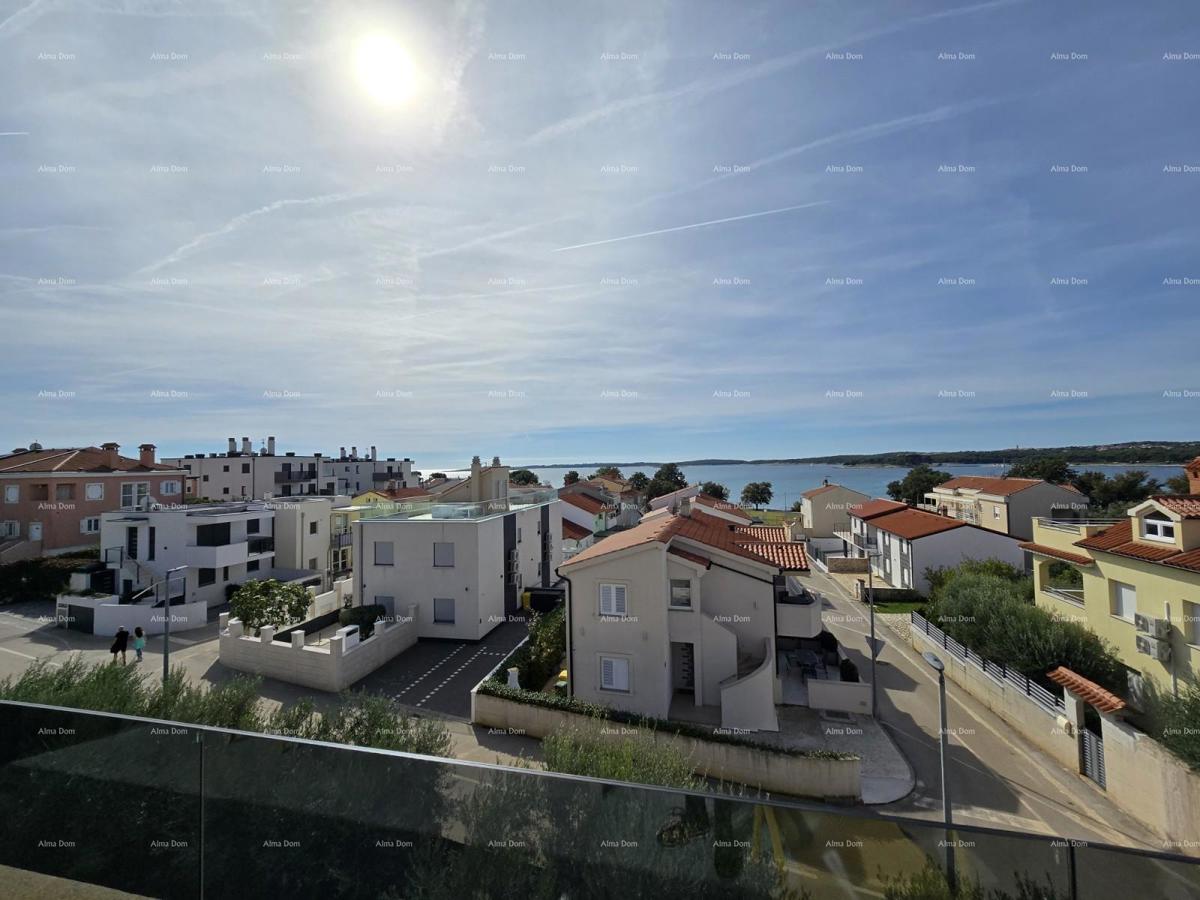 Casa moderna a Medulin, 800 m dal centro e 150 m dal mare – ideale per famiglie o come investimento!