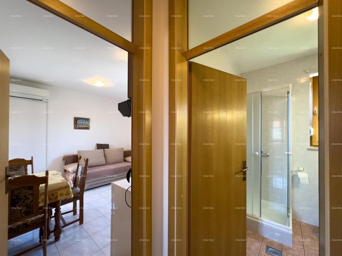 Vendiamo una casa con appartamenti in una posizione tranquilla a Medulin!