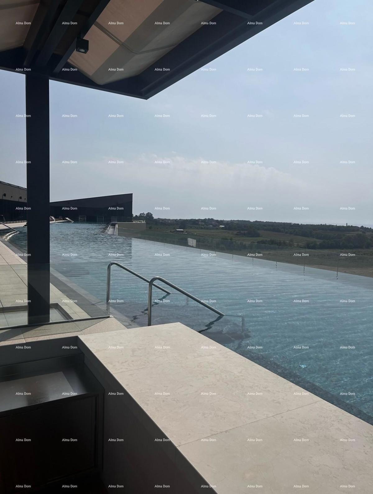 Lussuoso resort con piscina infinity sul tetto! Vendita di appartamento con vista mare e posto auto! Umago!