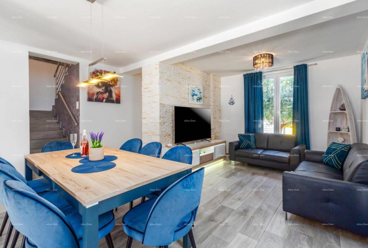 In Italian, the title "Prodaje se kuća MARČANA" translates to "In vendita casa MARČANA."