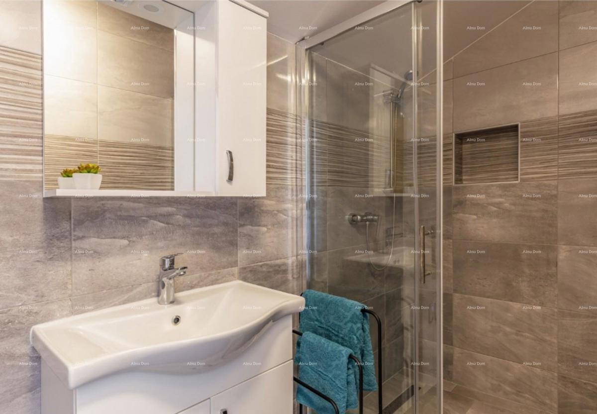 In Italian, the title "Prodaje se kuća MARČANA" translates to "In vendita casa MARČANA."