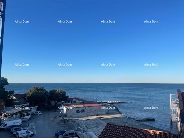 Appartamenti in vendita in un edificio residenziale e commerciale con vista mare, centro di Umago!