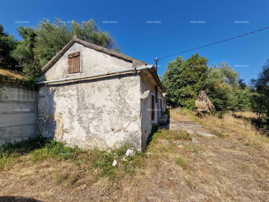 Terreno edificabile con rudere in vendita a Labin, con vista mare e progetto incluso.