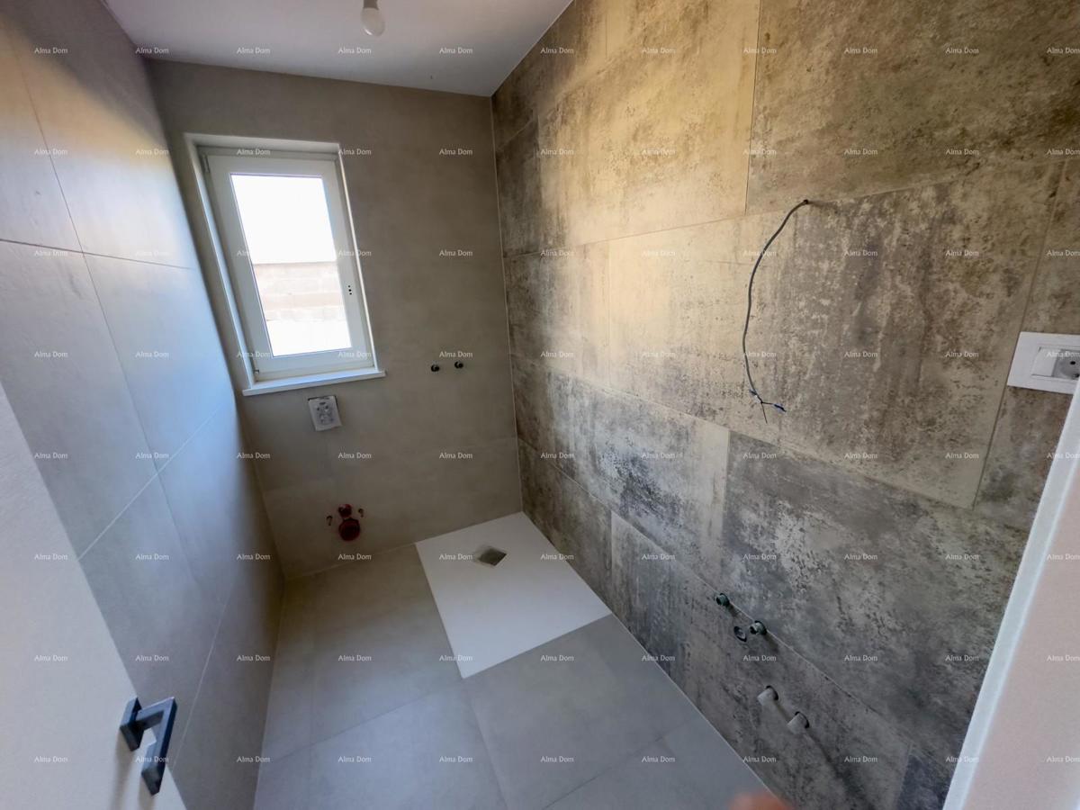 Vendiamo un appartamento con un grande giardino a Barban.